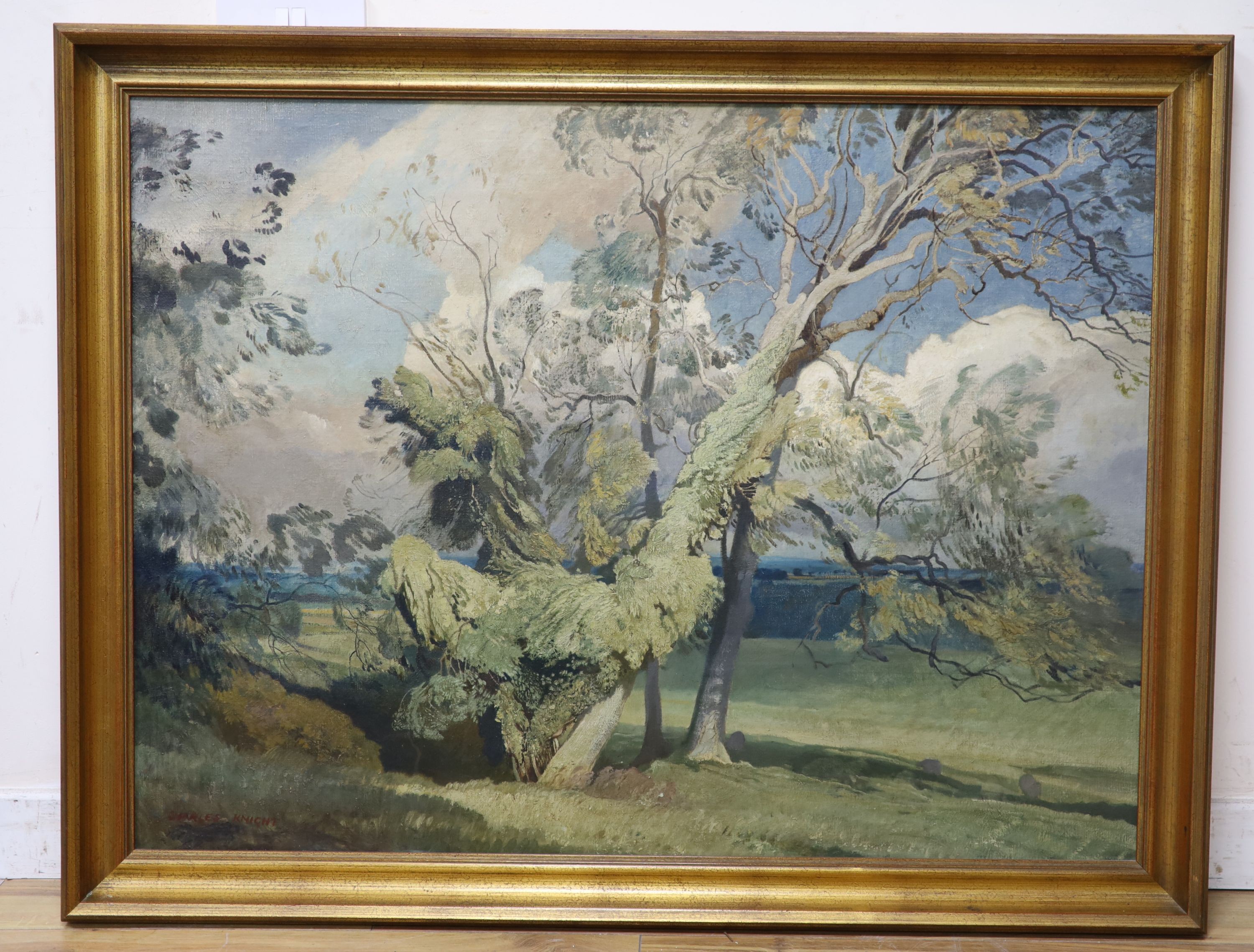 Charles Knight R.W.S.,R.O.I., (1901-1995), oil on canvas, ‘Summer Day’; Landscape with Ash tree and old mans beard, signed, 75 x 101cm.